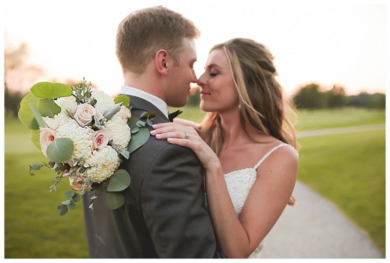 bride and groom embracing posed golf club indiana