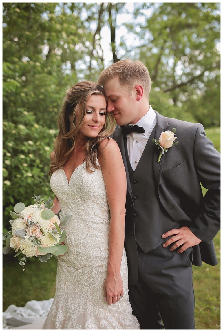 closeups of bride and groom embracing